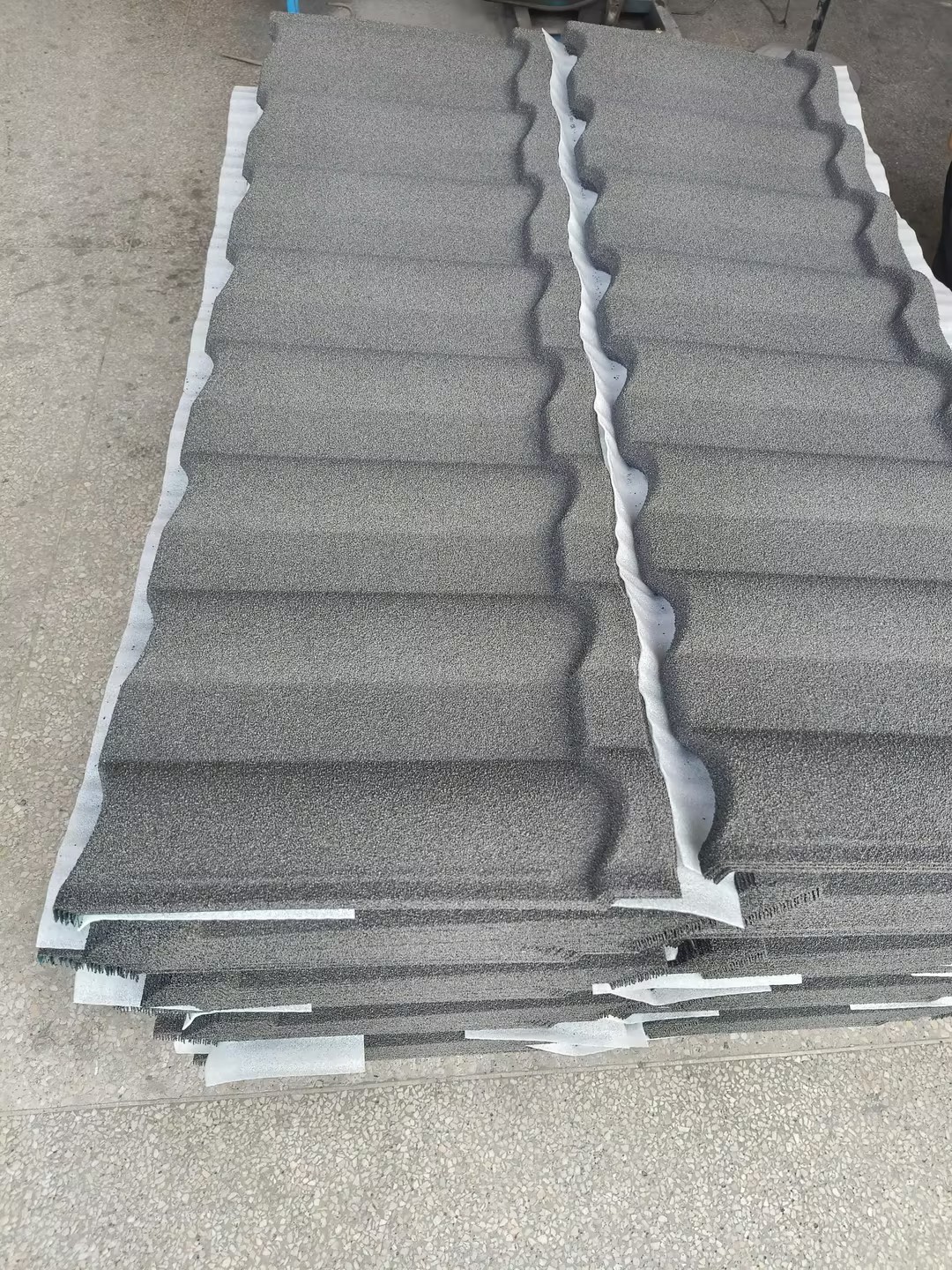 Enhancing Weather Resistance of Colored Stone Tiles Through Surface Adhesives